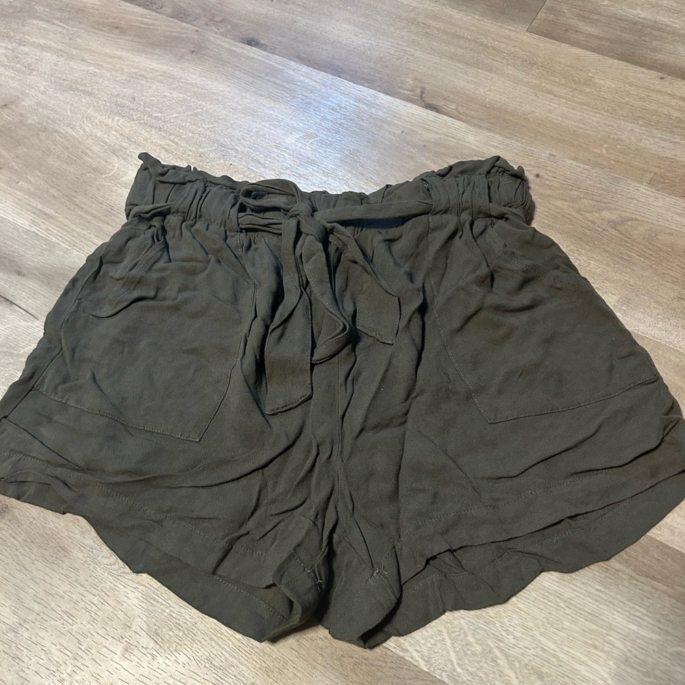 Brand is CI sono, size Large, Color dark green